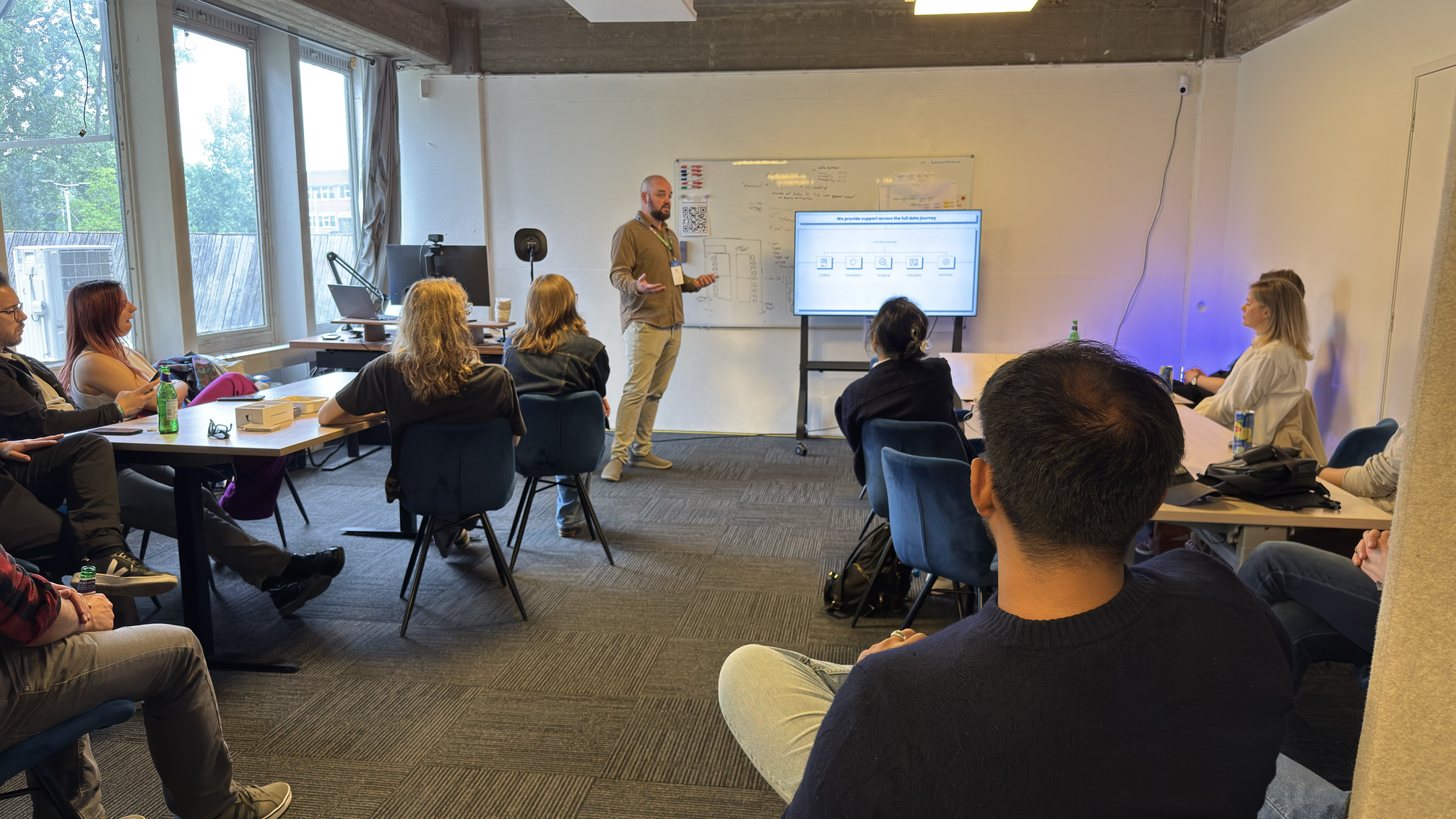 Jan presenting during Agency at Night 2025